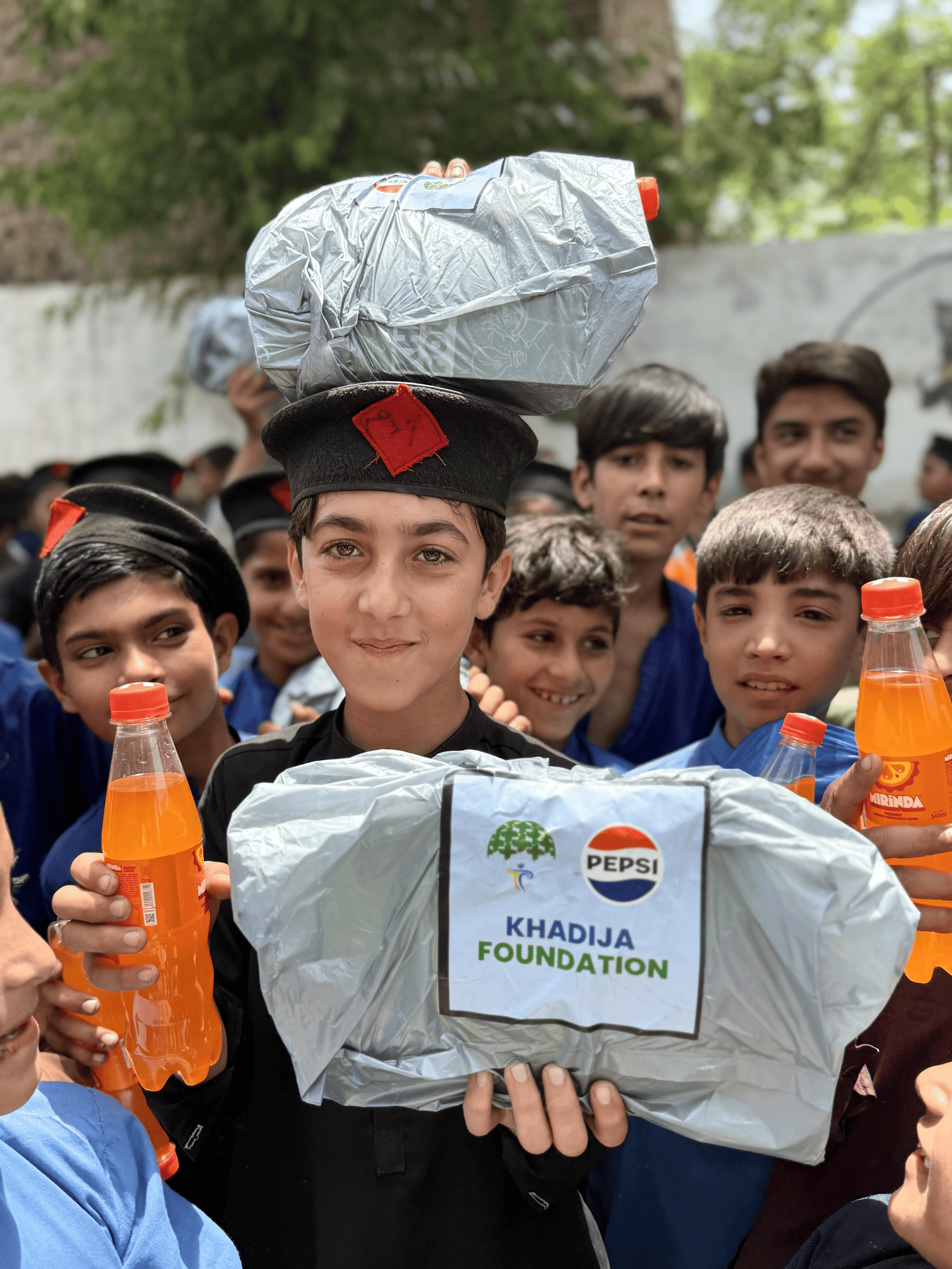 Students receiving school kits